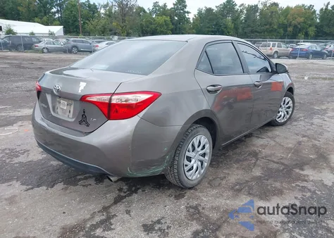 2017 Toyota Corolla Le z USA, uszkodzony, nr VIN 5YFBURHE5HP665334